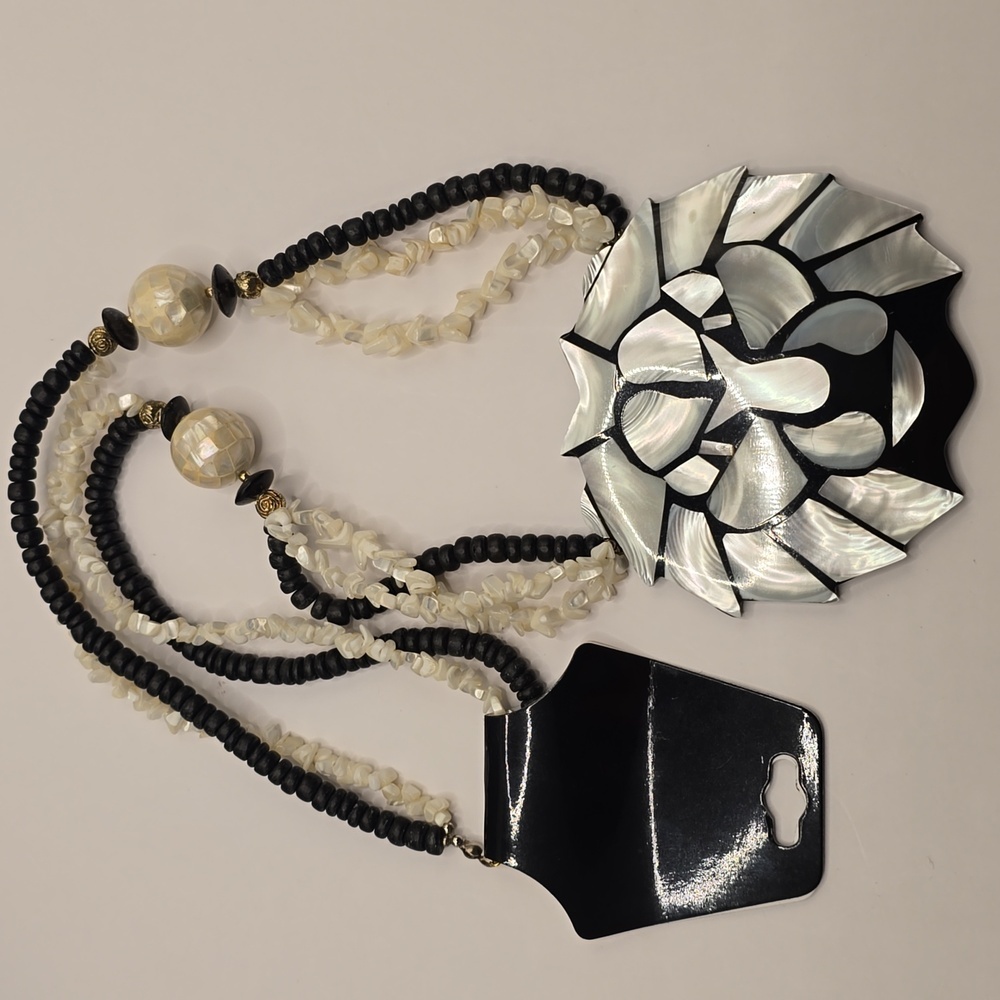 Lee Sands Mother of Pearl Lion Head Pendant Necklace